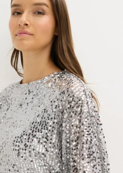 Vestido de lentejuelas con detalle de lazo