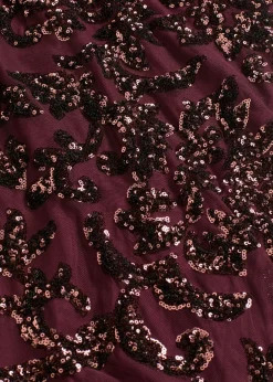 Vestido de lentejuelas con escote en la espalda