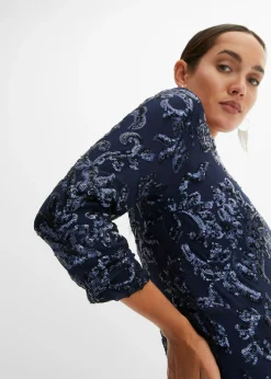 Vestido de lentejuelas con escote en la espalda