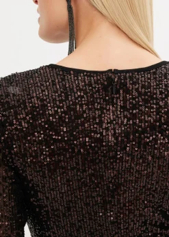 Vestido de lentejuelas con hombreras
