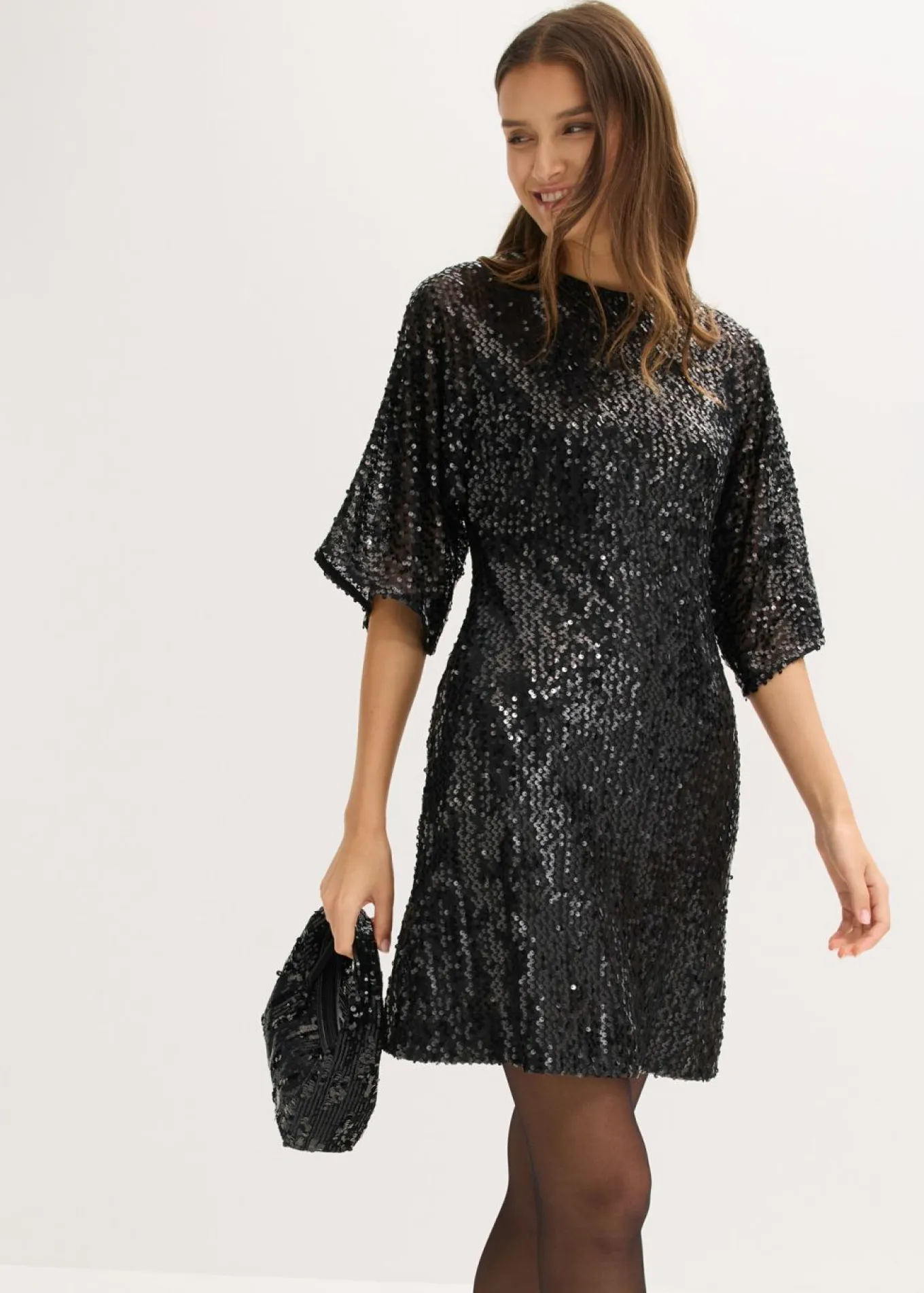 Vestido de lentejuelas con detalle de lazo