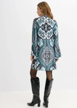Vestido de punto con cuello alto y mangas con volantes