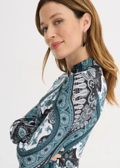 Vestido de punto con cuello alto y mangas con volantes