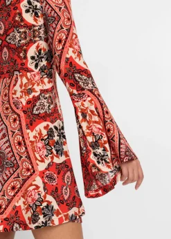 Vestido de punto con cuello alto y mangas con volantes
