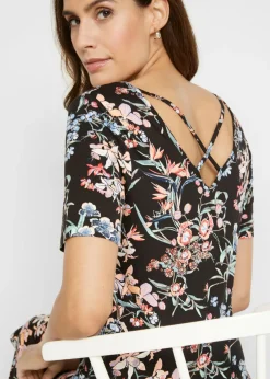 Vestido de punto hasta la rodilla con corte en A