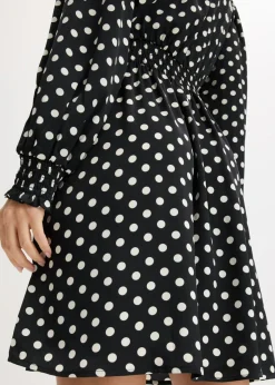 Vestido de satén fluido con lazo en el cuello