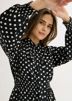 Vestido de satén fluido con lazo en el cuello