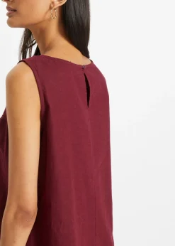 Vestido largo de lino con motivo perforado en el escote y abertura lateral