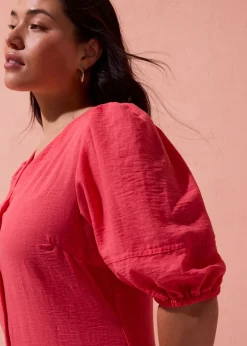 Vestido midi acampanado con mangas abullonadas