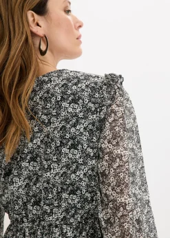 Vestido midi con volantes