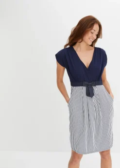 Vestido peplum con lazo en la cintura