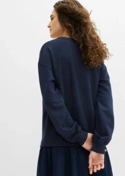 Vestido tipo sudadera con falda