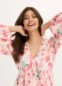 Vestido tipo túnica con falda acampanada