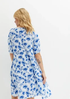 Vestido tipo túnica hasta la rodilla con detalles de encaje