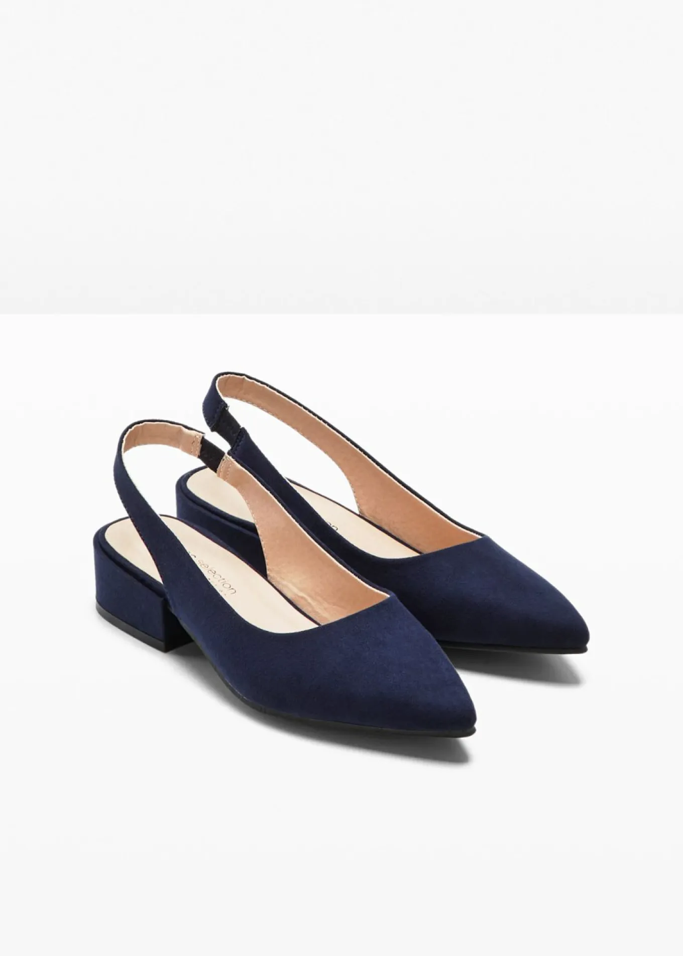 Zapatos con tacón plano y talón al descubierto