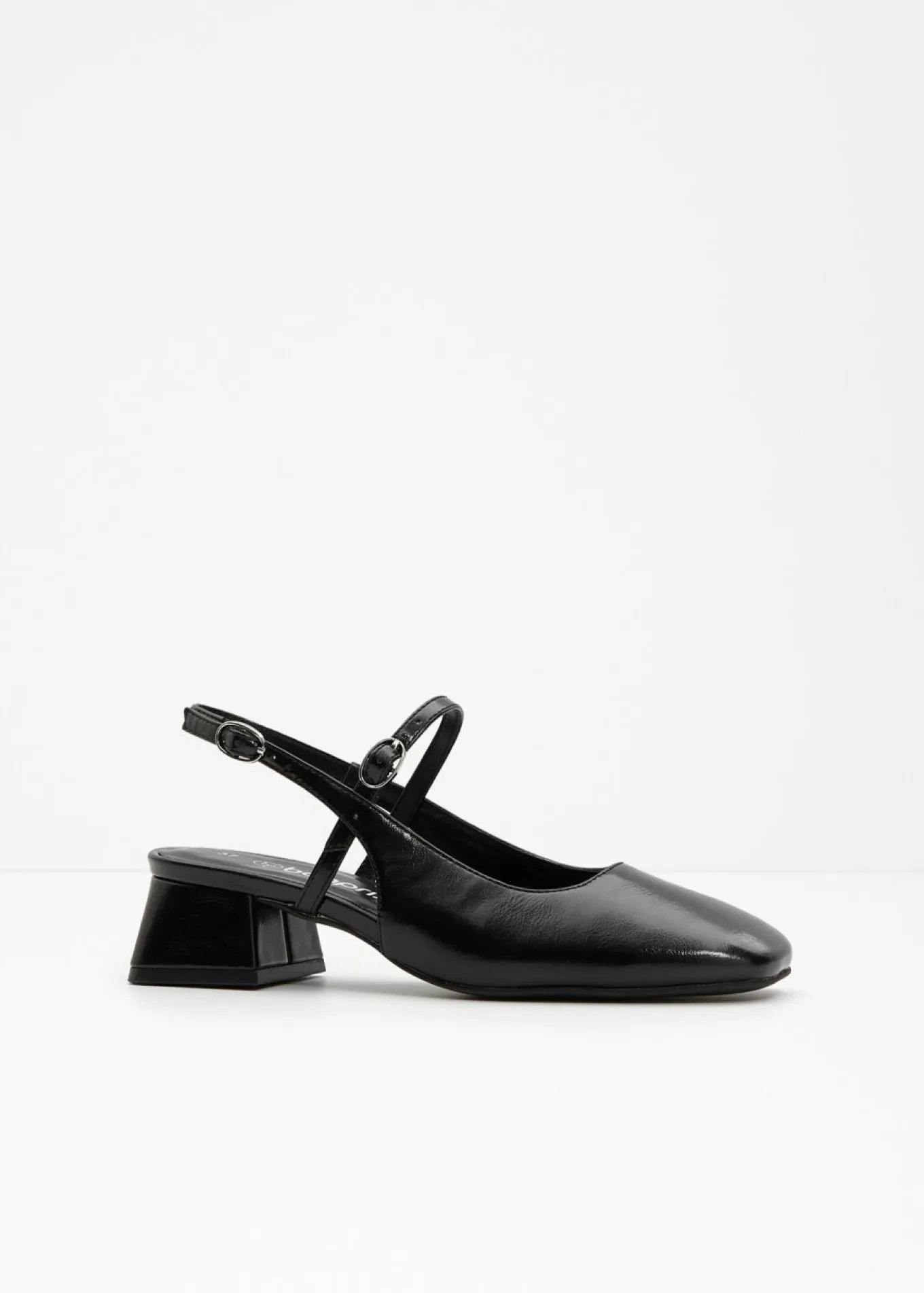 Zapatos con talón al descubierto y tira