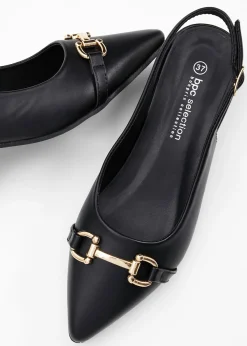 Zapatos de tacón con talón al descubierto