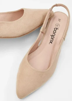 Zapatos de tacón con talón al descubierto